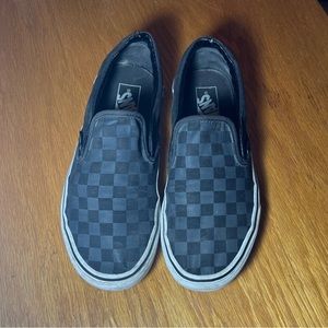 Black and grey checkered vans
